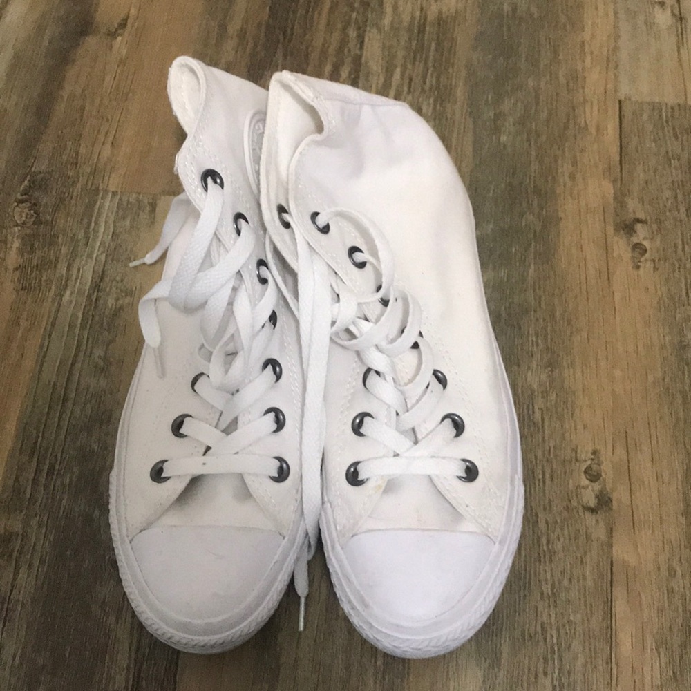 All white Converse high tops
